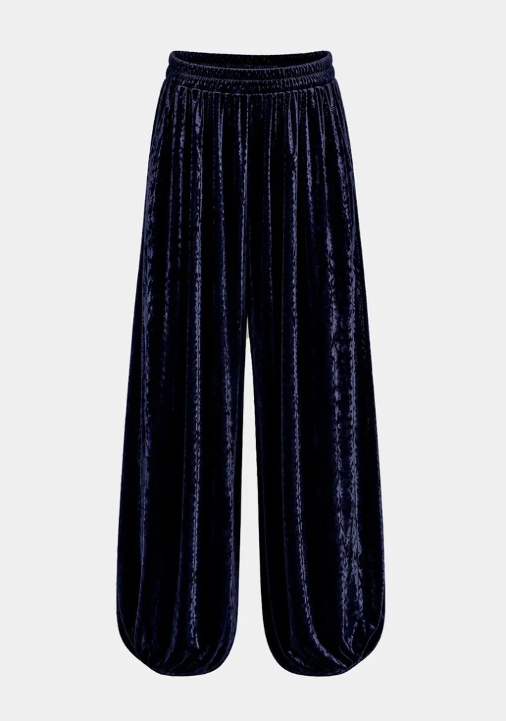 Calça pantalona de veludo azul-marinho com cintura elástica e pernas amplas de caimento reto, fotografada em fundo cinza claro.